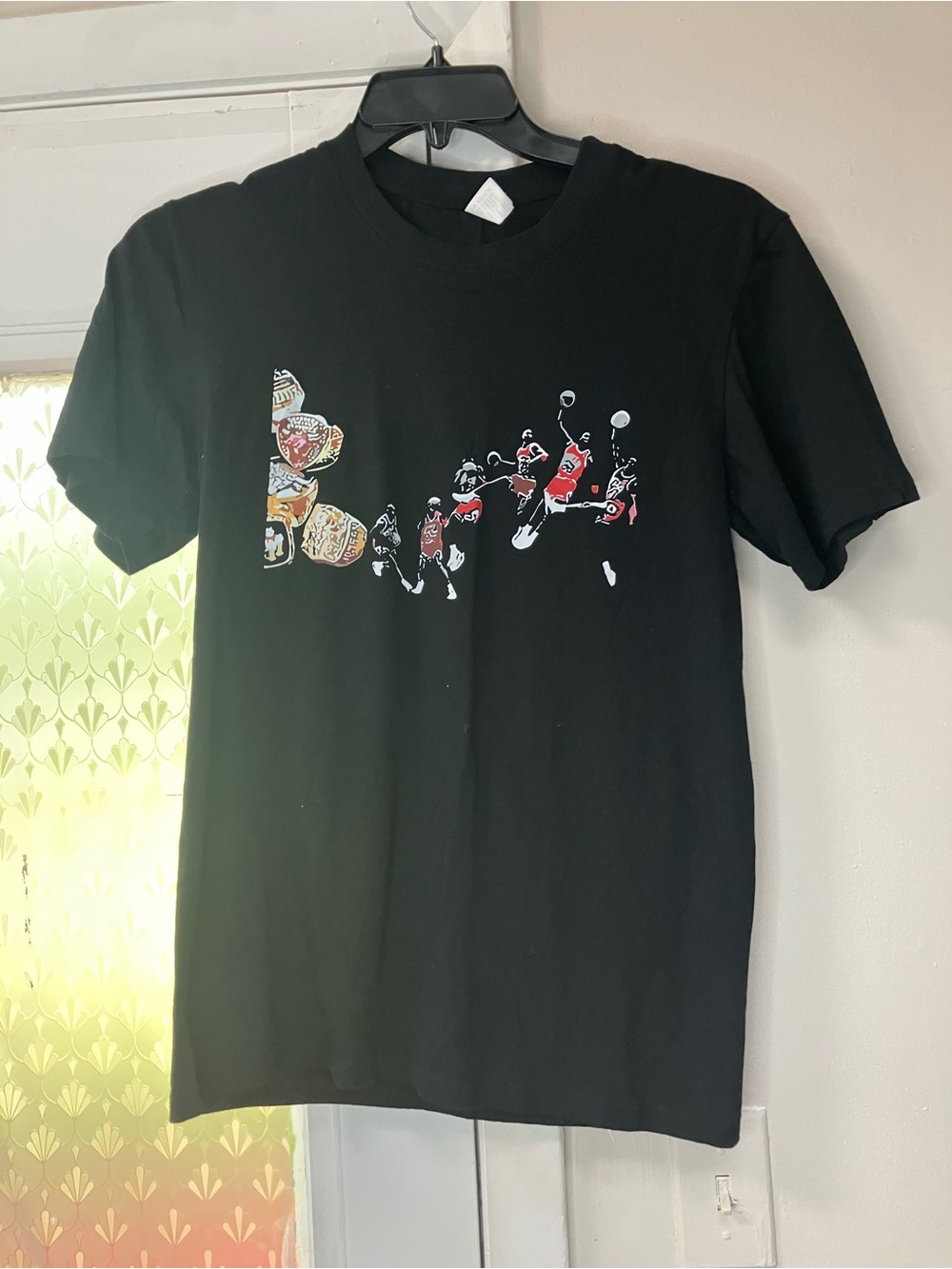 Black Graphic Short-Sleeve Tee with Red Accent Basketball Motif